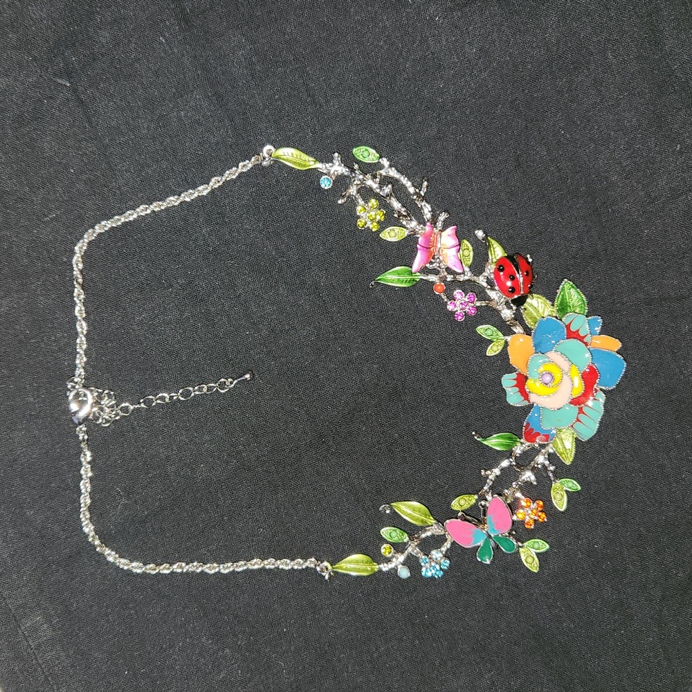 Multicolor flowers, vines, butterflies, ladybug silver tone statement necklace